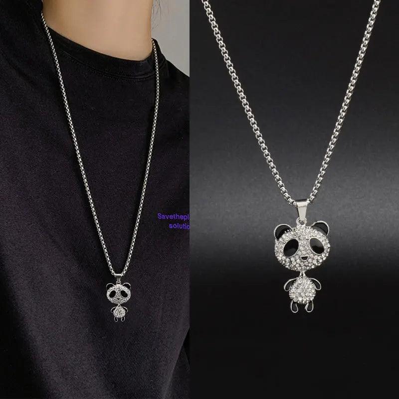 Panda pendant necklace worn on a black shirt, rhinestone panda face and chain