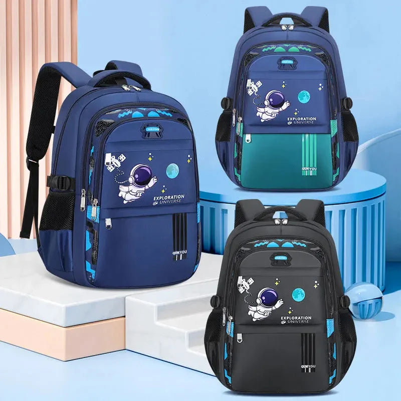 Kids astronaut backpack set in navy and black with teal accents, front zip and straps
