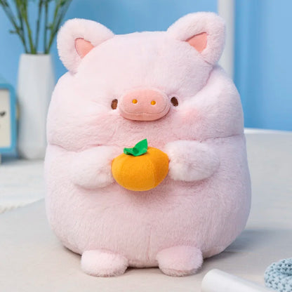 Pink pig plush with orange carrot and green leaf detail, front view.