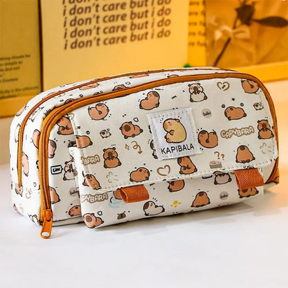 Capybara print pencil bag with front patch pocket and orange handle pull tab