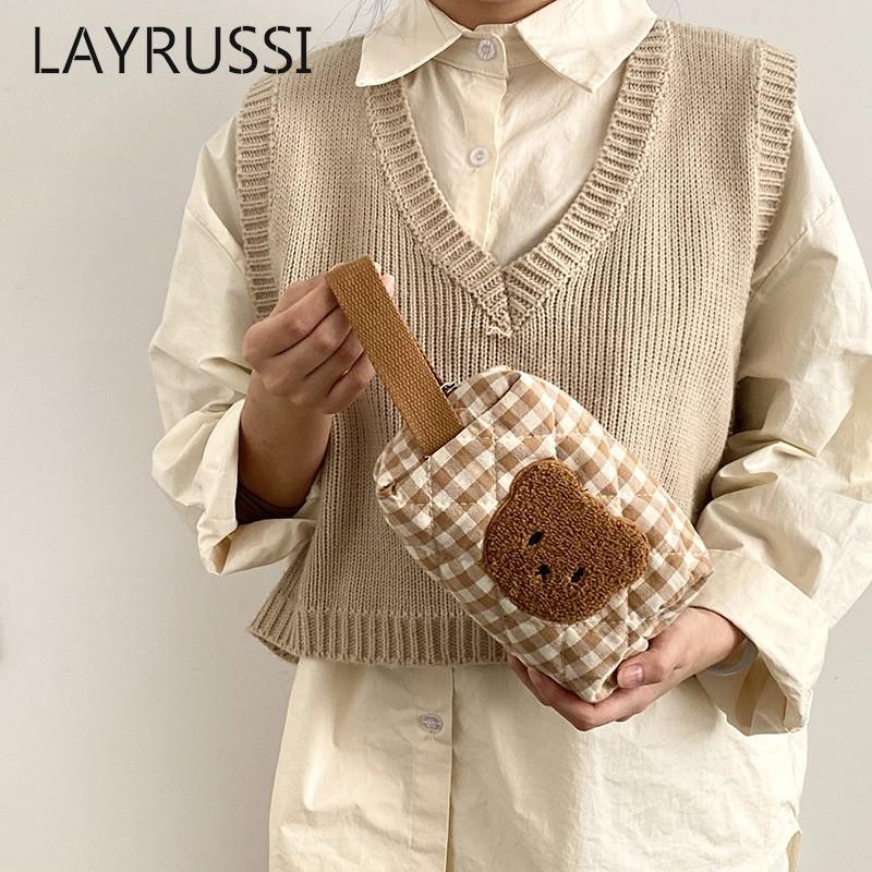 Gingham teddy bear cosmetics bag held with detachable shoulder strap
