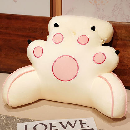 White cat-paw reading pillow with black ear tips and pink outlined face circles
