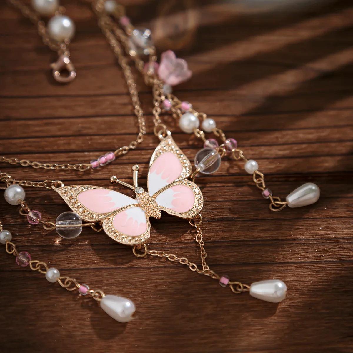 Butterfly imitation pearl multi-layer necklace with pink butterfly pendant and pearl bead strands