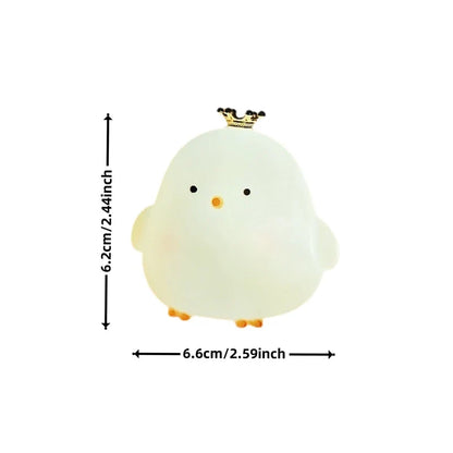 White silicone chick LED night light with tiny crown on top; measurements shown