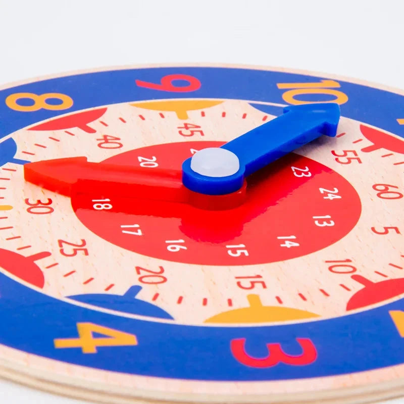 Close-up of Montessori wooden learning clock face with blue minute hand and hour hand