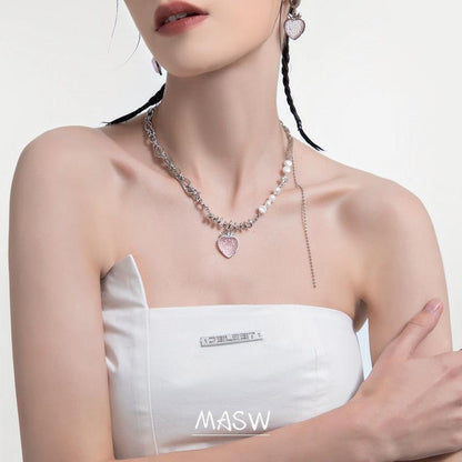 Strawberry pendant necklace on model: pink glitter heart charm with pearl-bead strand