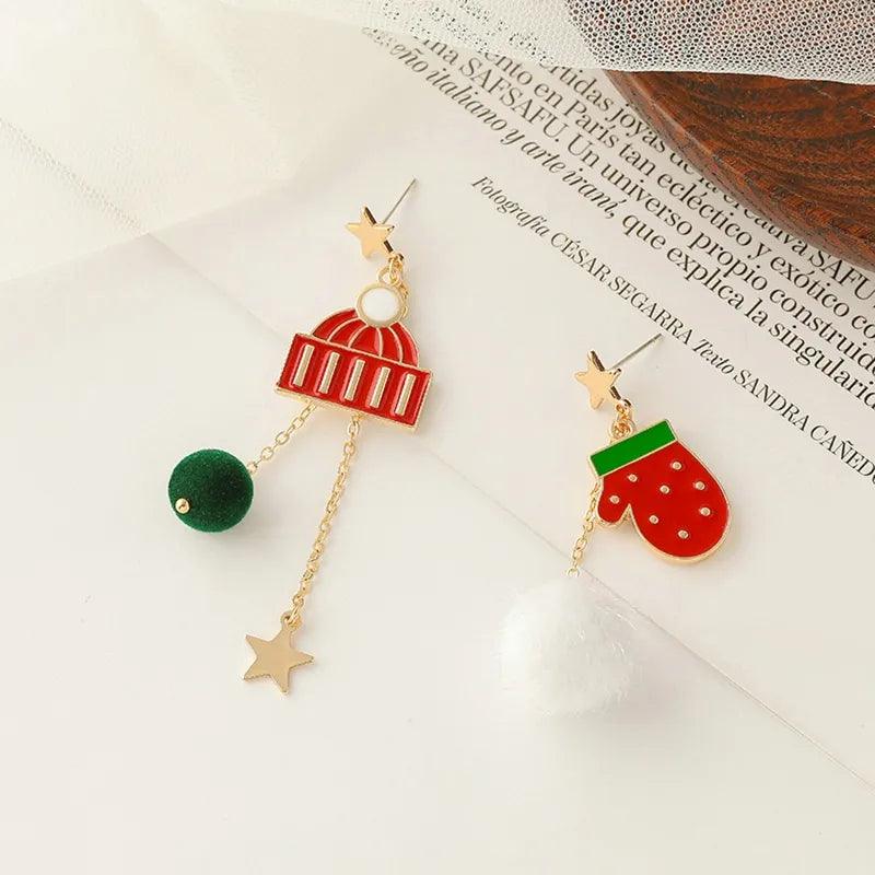Gold-tone holiday drop earrings with red striped arch charm and green strawberry charm