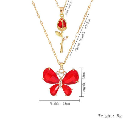 Gold-tone butterfly rose necklace with red butterfly flower pendant and red rose teardrop charm