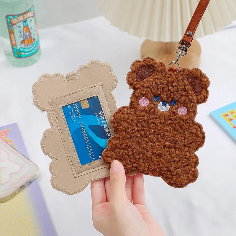 Brown plush animal photo card sleeve with clear window and tan strap