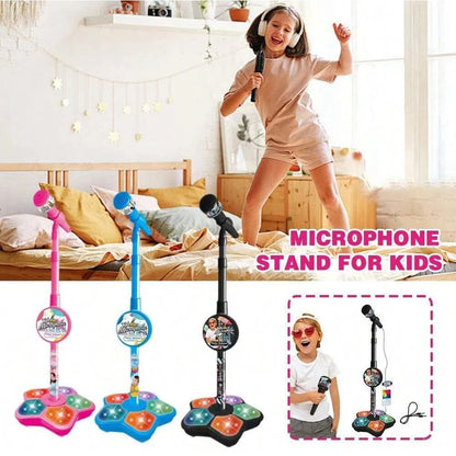 Kids microphone stand toy with colorful base, shown with microphones in pink, blue, and black