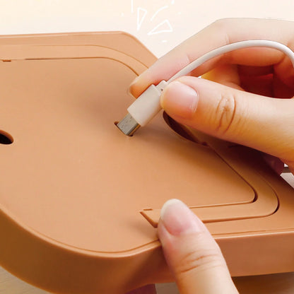 Toast-shaped LED makeup mirror, showing USB power cable connection port on base