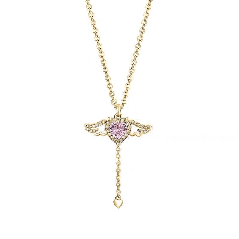 Pink crystal heart angel wings pendant necklace, gold-tone chain with heart drop