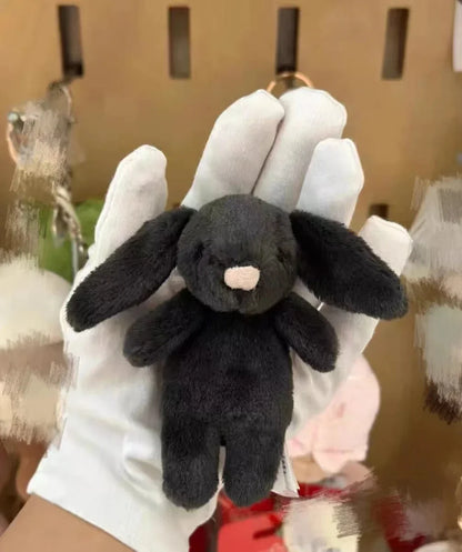 Black rabbit plush keychain with metal clasp, small cream nose, long ears