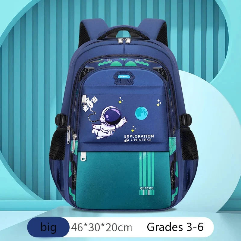 Kids navy astronaut backpack with teal lower panel, astronaut print, and two front zippers