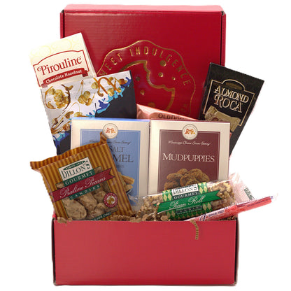 Assorted snack gift box with red lid and multiple candy packages.