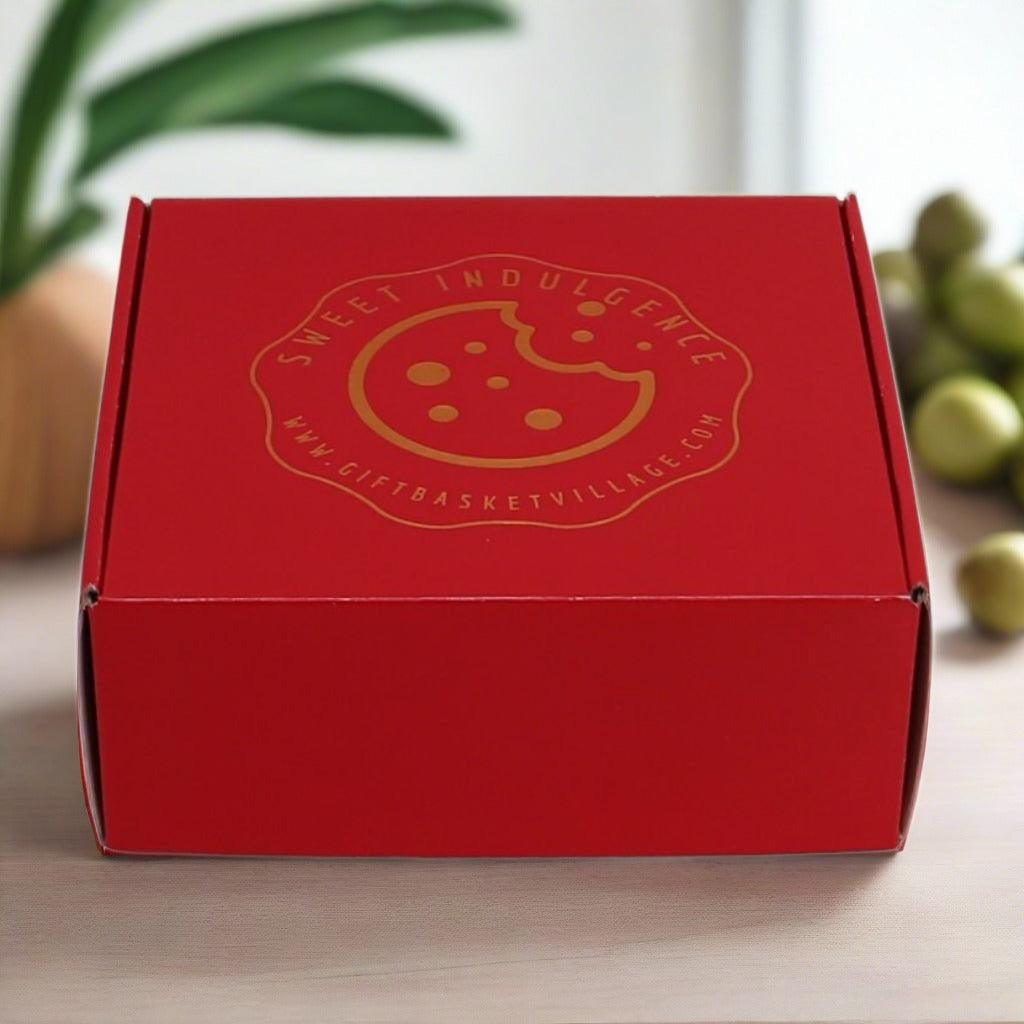 Red gift box with gold logo on the front panel.