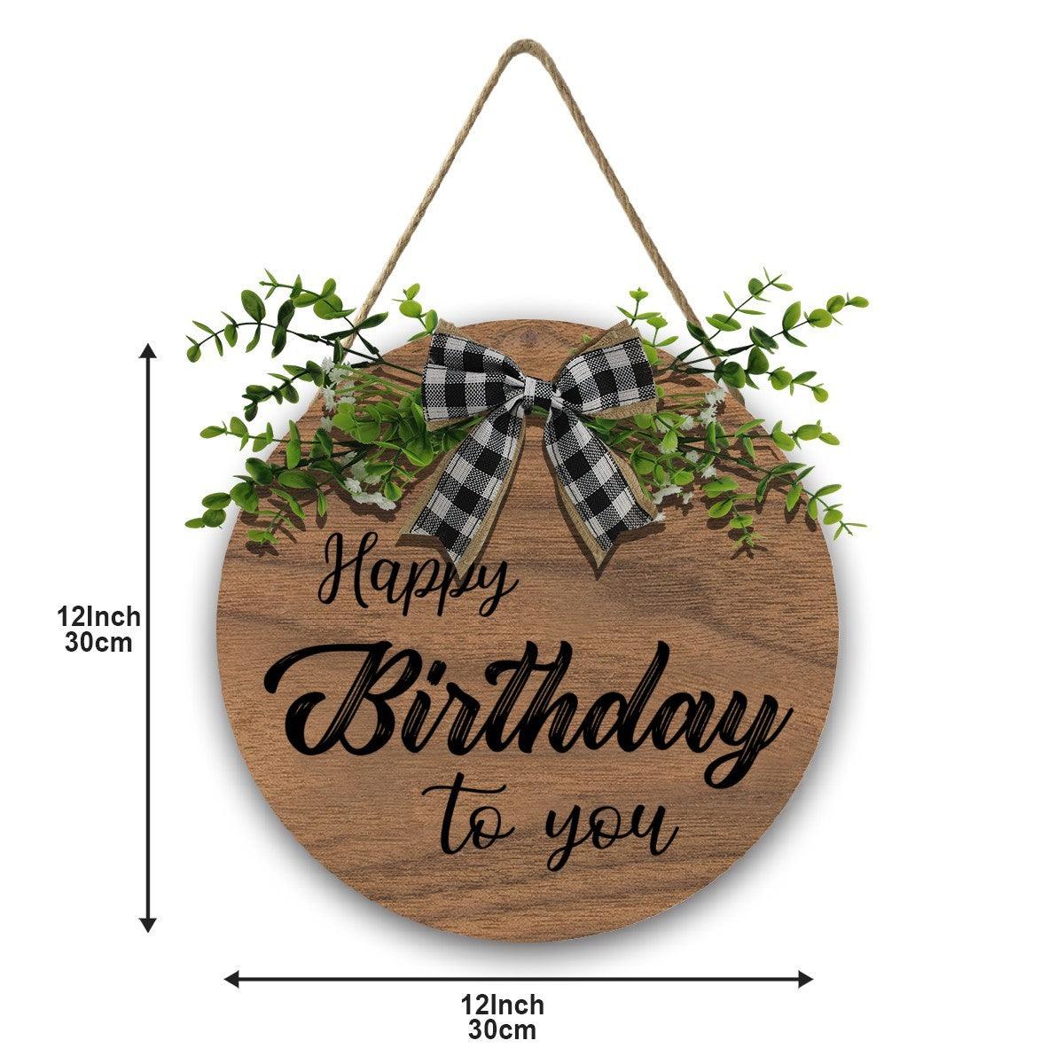Wooden round Happy Birthday sign with plaid bow, green leaves, rope hanger, 12 in