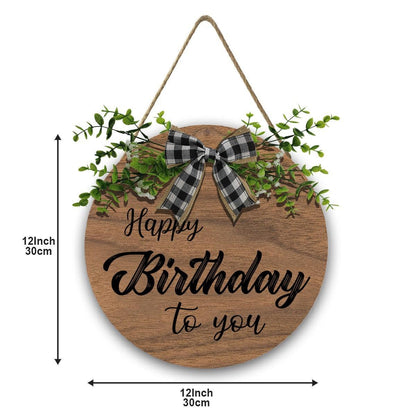 Wooden round Happy Birthday sign with plaid bow, green leaves, rope hanger, 12 in