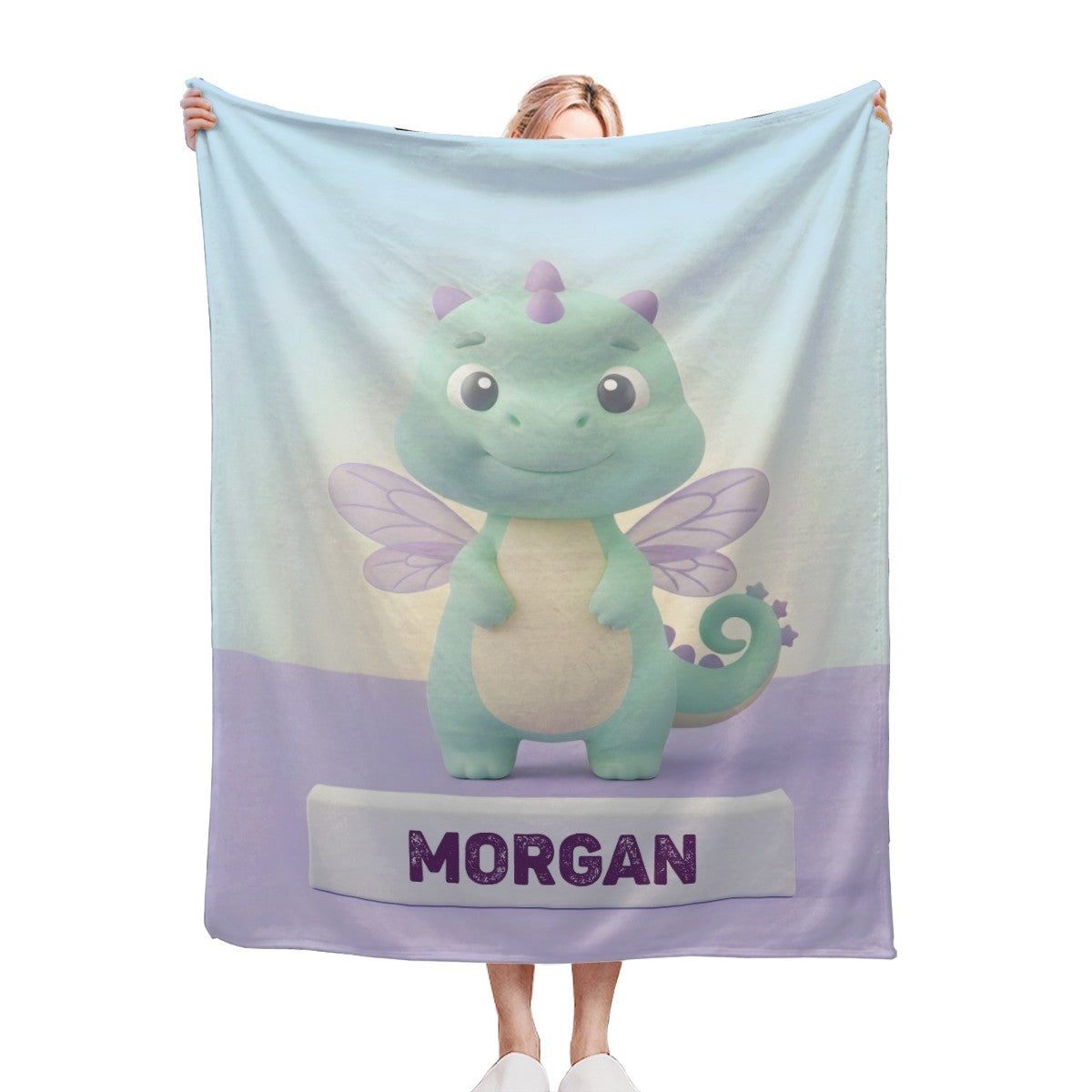 Light blue and purple flannel blanket with cute dragon graphic and “MORGAN” text