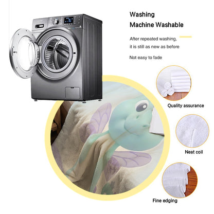 Throw blanket with dragon print and “MORGAN” stripe shown with washing machine graphic