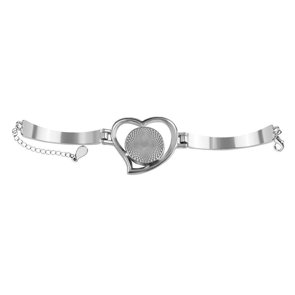 Heart-shaped locket bracelet with silver-tone frame and braided texture insert