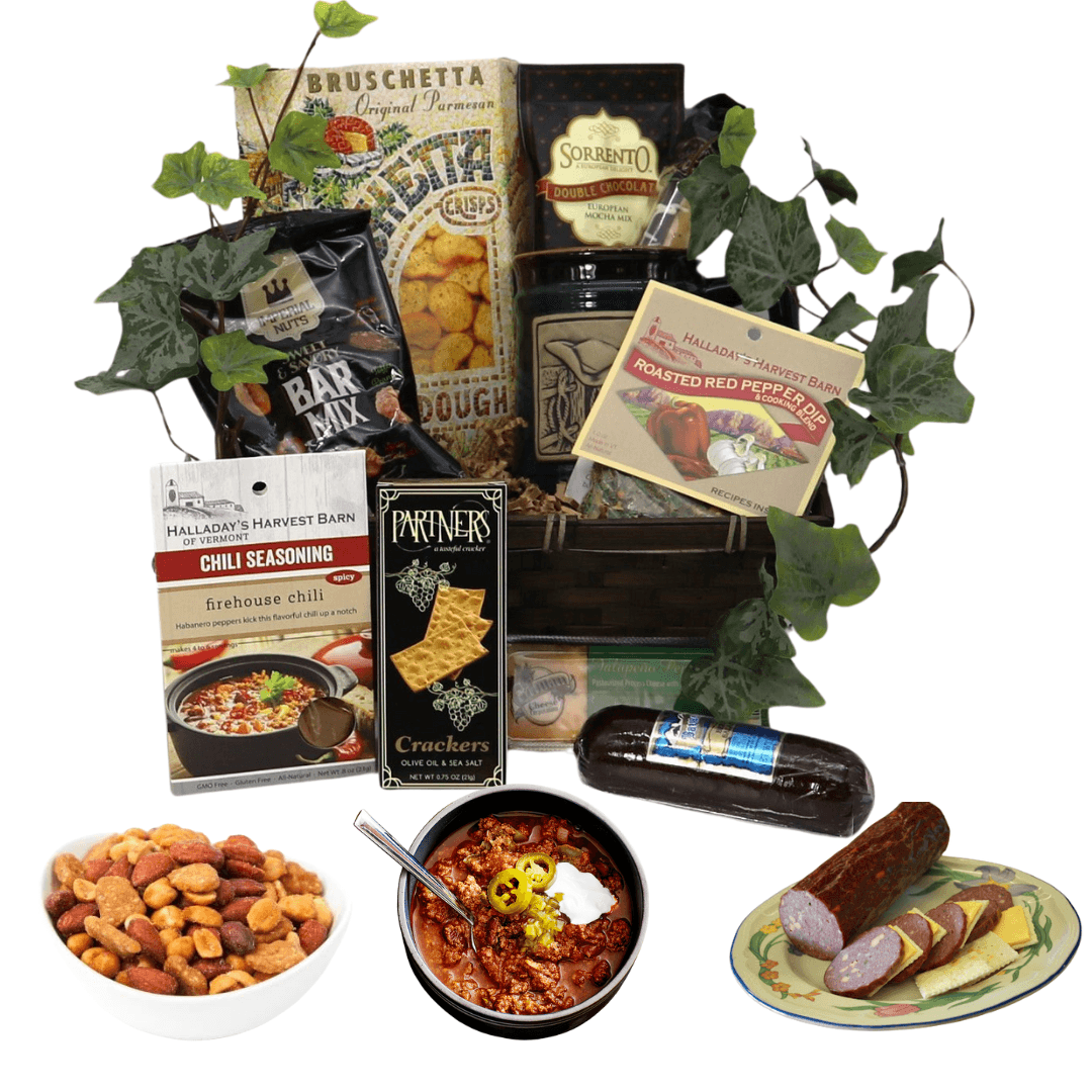 Gift basket with assorted snacks, crackers, nuts, and a bottle with mini plates