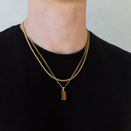 Gold tiger eye pendant necklace set with two layered chains and rectangular stone charm