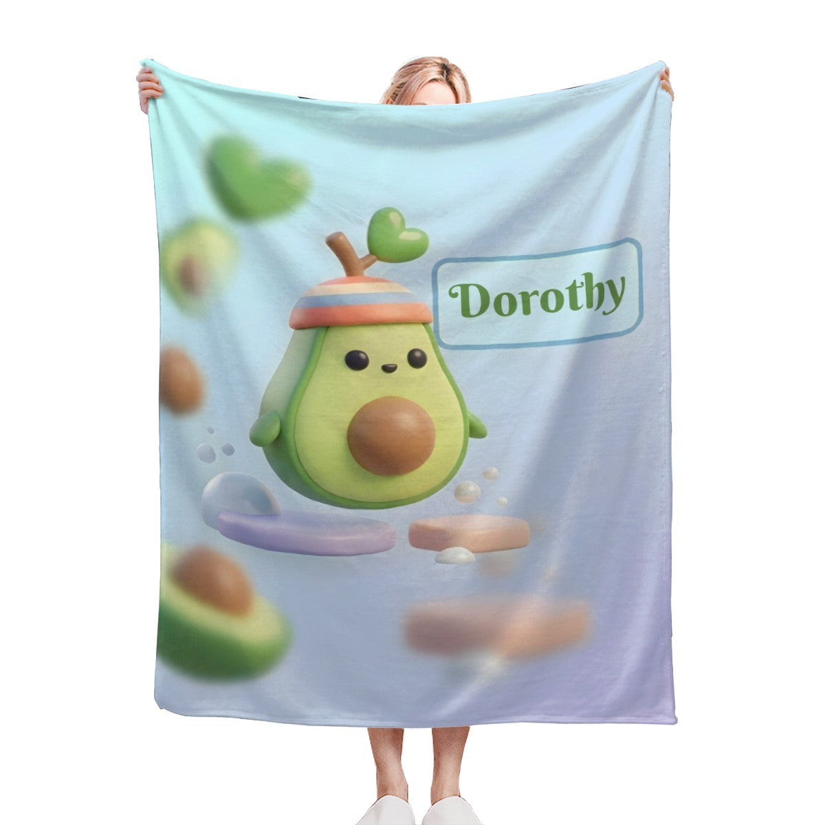 Light blue avocado cartoon blanket with Dorothy text and character face