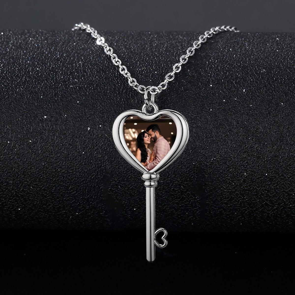 Heart locket photo key necklace with silver chain and key pendant, heart window showing couple