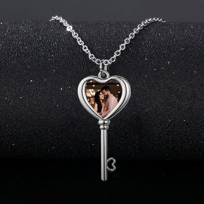 Heart locket photo key necklace with silver chain and key pendant, heart window showing couple