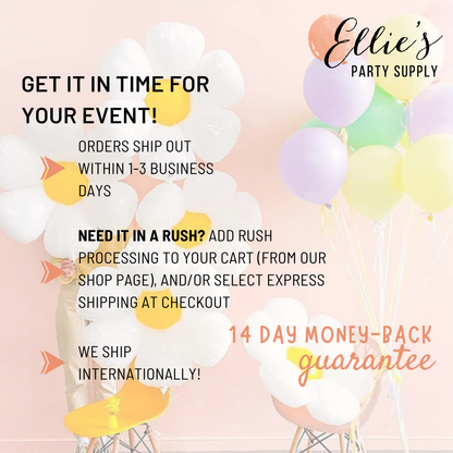 Pastel balloons on strings with white balloon arch