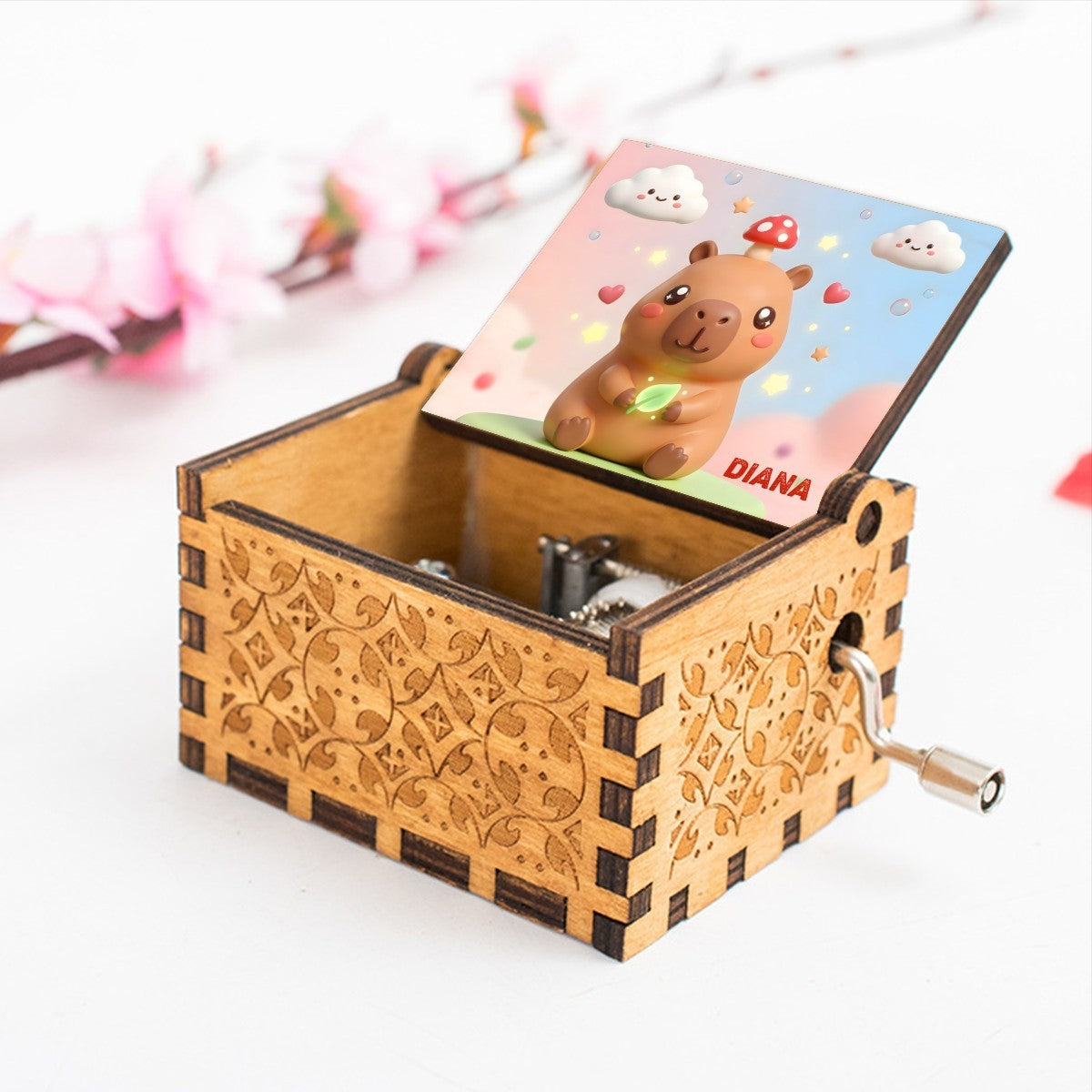 Wooden music box with capybara character lid and 'DIANA' label