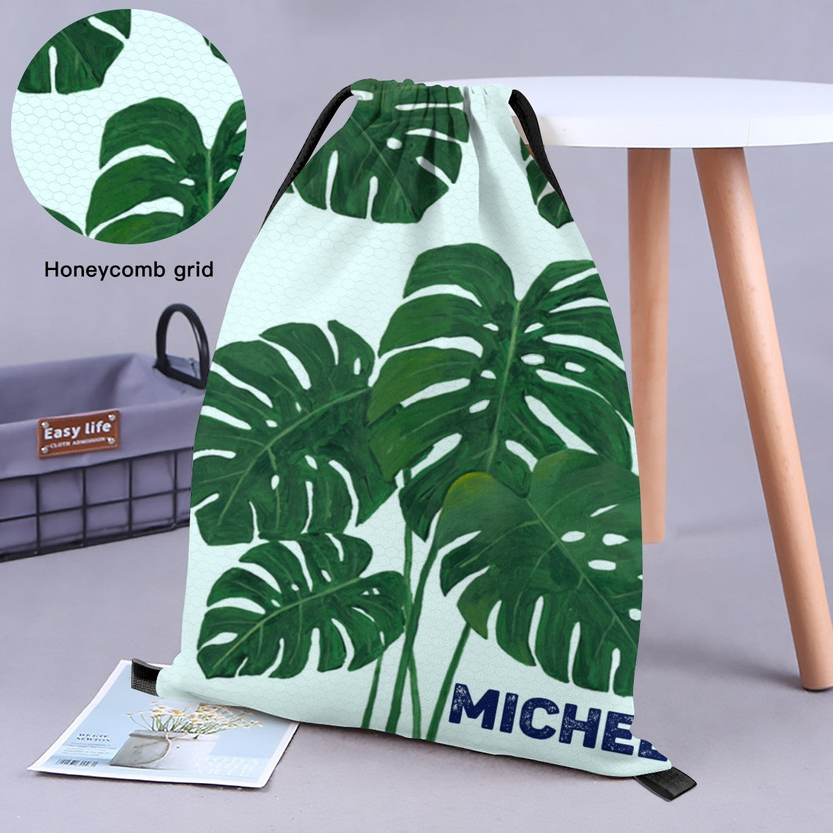 Drawstring bag with honeycomb texture, green monstera print and MICHEL name