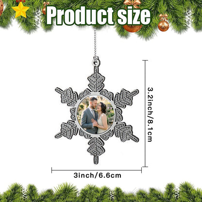 Star-shaped photo ornament hanging from a silver chain, with a circular couple photo.
