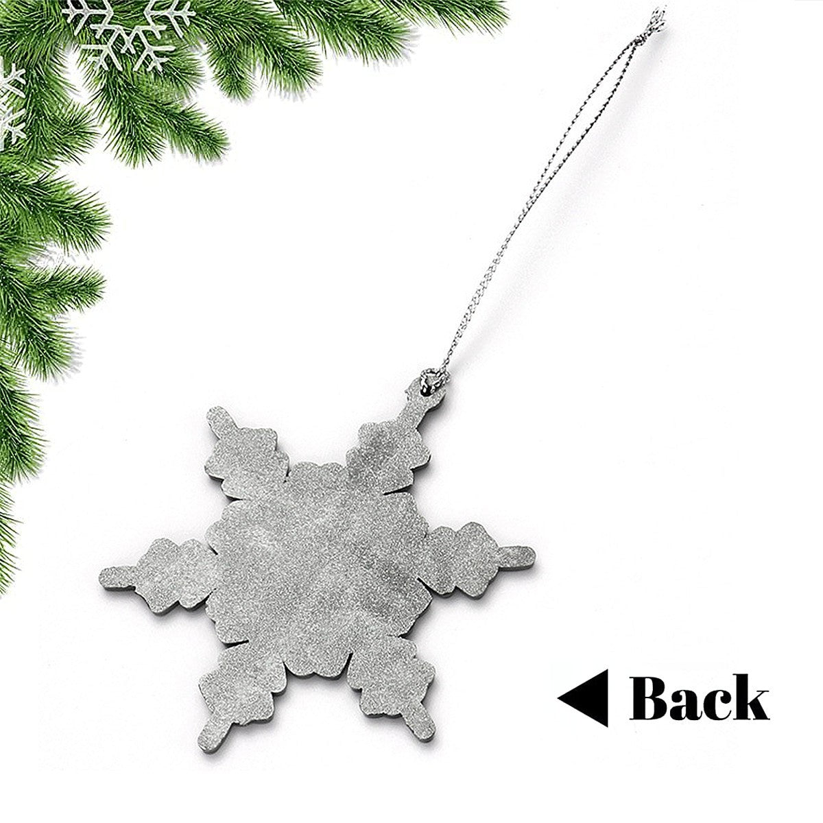 Silver star-shaped ornament backside with hanging chain, no photo visible.
