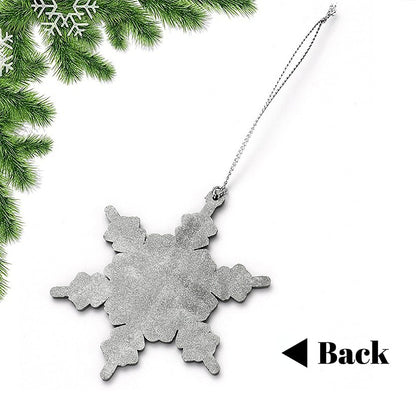 Silver star-shaped ornament backside with hanging chain, no photo visible.