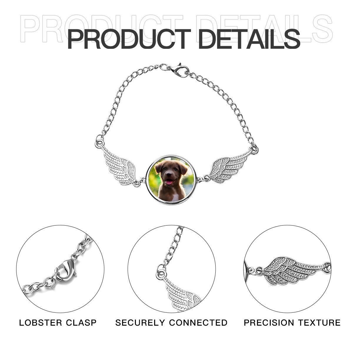 Pet memorial bracelet product diagram with round photo locket, angel wings, and lobster clasp