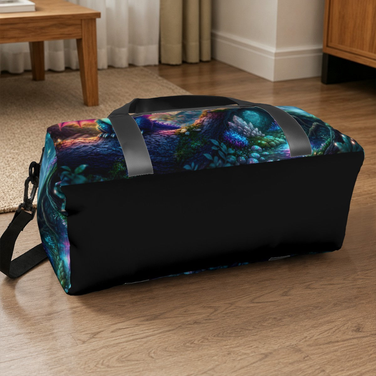Black-bottom duffel bag with colorful dragon space print and wide carry handles