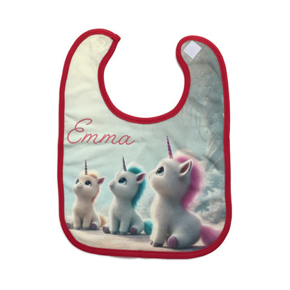 Personalized baby bib with three unicorns and “Emma” on mint fabric, red trim.