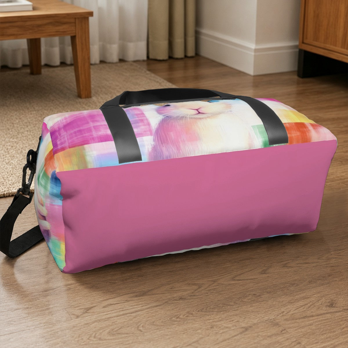 Colorful rabbit print duffel bag with black straps and wide bottom panel