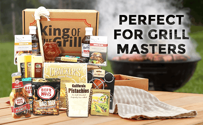King of the Grill gift box with crackers, pistachios, nuts, and sauces on tray