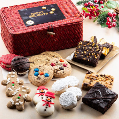 Christmas cookie sampler in red woven gift basket with snowman, gingerbread, and brownies