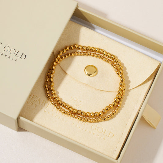Gold-tone bead bracelet set with two beaded loops in gift box