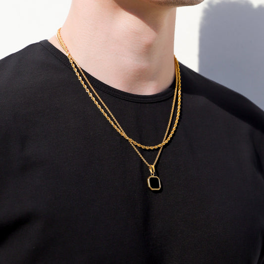 Gold chain necklace with square black onyx pendant, double-strand layering