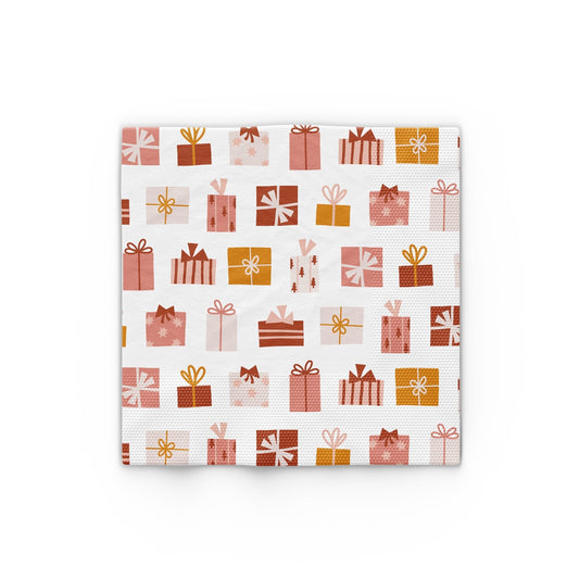 Christmas present icon paper napkins, white with red, pink, and gold gift patterns