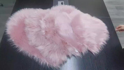 Light pink heart-shaped plush area rug with fluffy faux wool pile