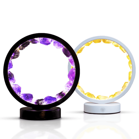 Amethyst crystal ring lamp with black base, glowing purple gemstone circle in a round frame.