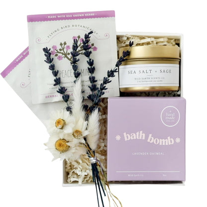 Mini lavender spa gift set with bath bomb, sea salt sage candle, and tea bag
