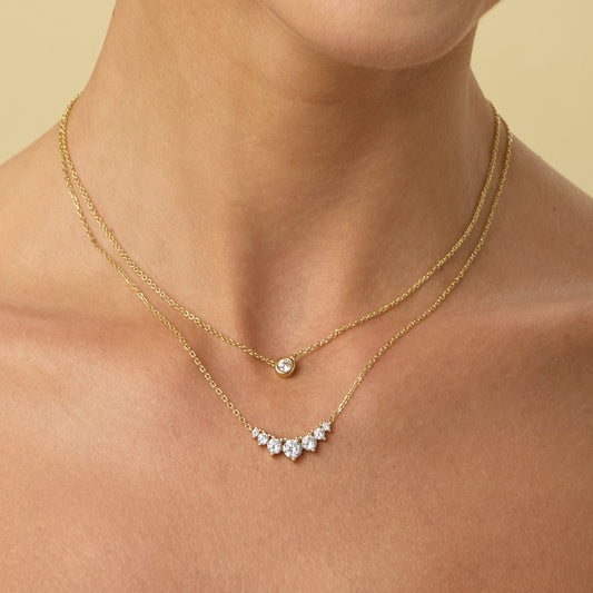 Gold filled layered necklaces with bezel-set diamond pendants