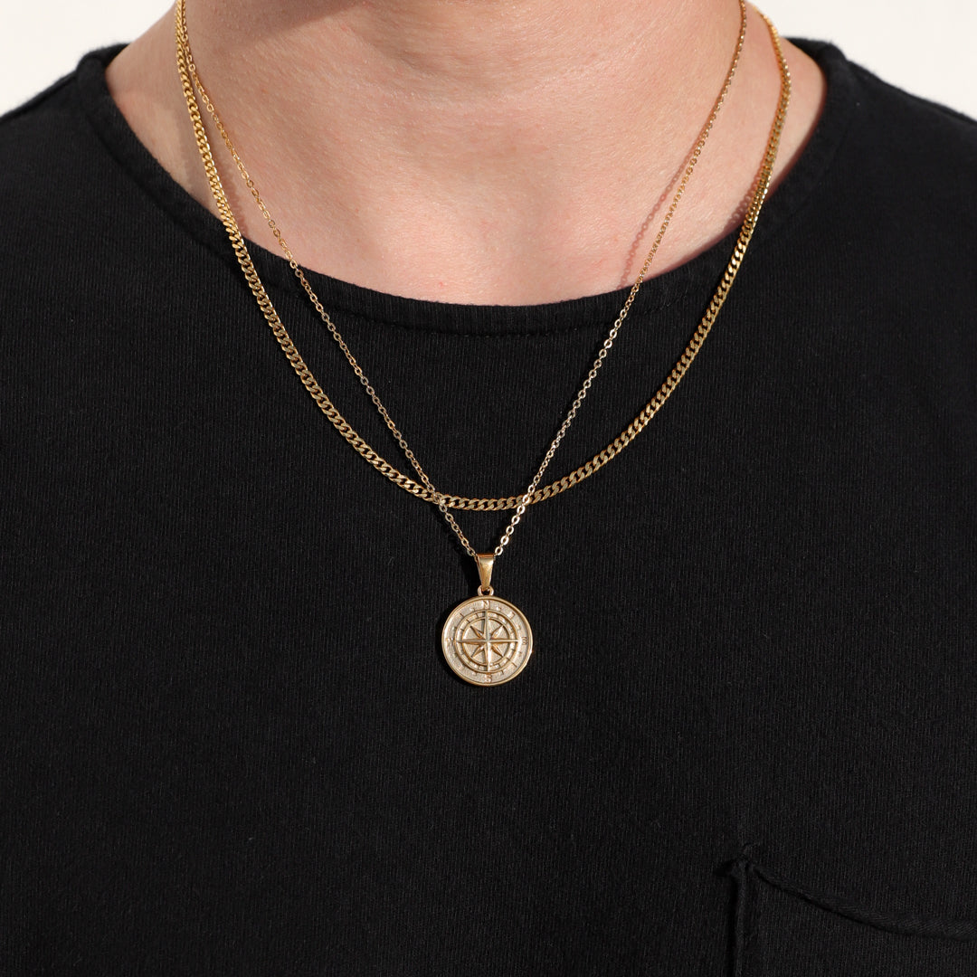 Gold compass pendant necklace set with two round pendants and layered chain straps